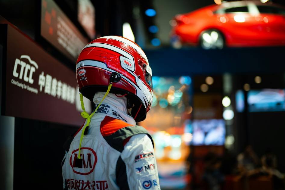 Close-up of a rider leaning into a high-speed corner