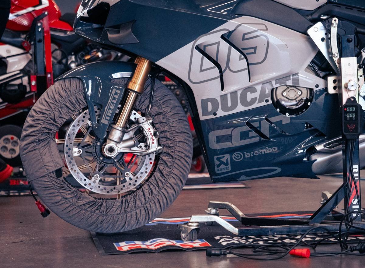 Close-up of MotoGP tire tread showing advanced Tire Compound Innovations under thermal stress